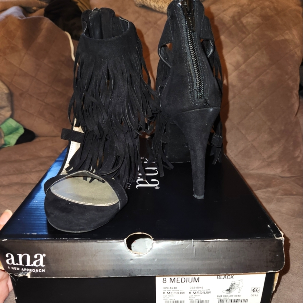Black fringed heels
